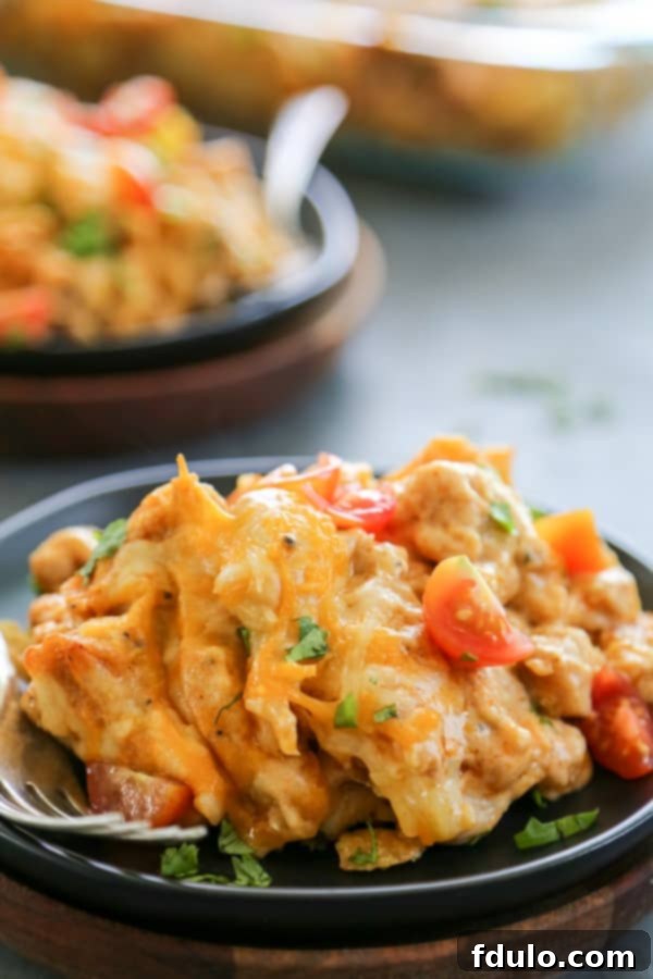 Easy Chicken Enchilada Bake with Fritos instead of tortillas.