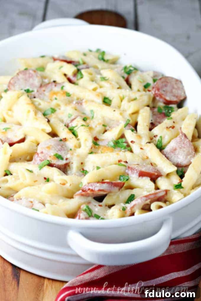 Spicy Smoked Sausage Alfredo Bake, with pasta and a cream sauce.