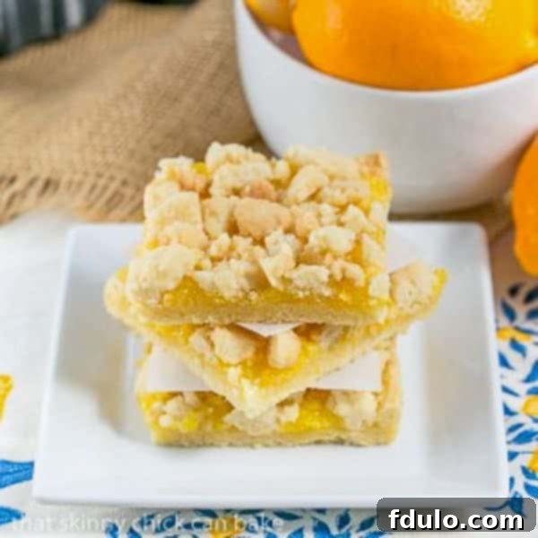 Golden Lemon Streusel Slices 2 Meyer Lemon Streusel Bars - A scrumptious lemon bar with a sugar cookie crumble topping