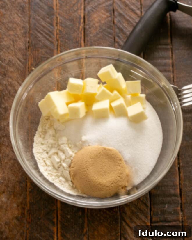 Traditional Dutch Apple Pie 6 Make the crumb topping by cutting the butter into sugars and flour.