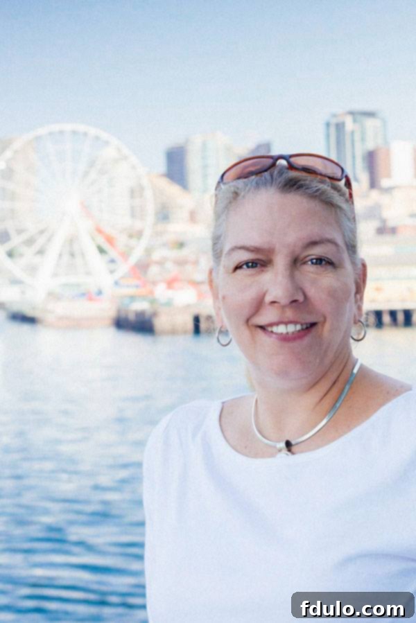 A beautiful portrait of Joan Hayes in Seattle, capturing her warm and engaging personality.