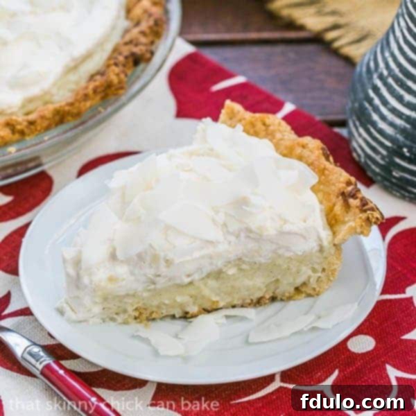Tropical Dream Pie 2 Coconut Cream Pie - Coconut crust filled with creamy coconut laden custard with a decadent whipped cream topping!