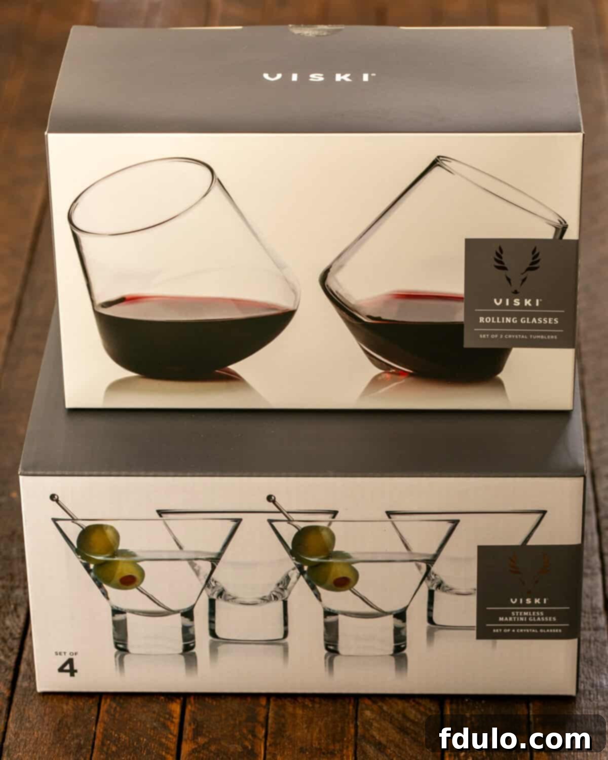 The Grand Mimosa 3 Two stacked boxes of Viski glasses.