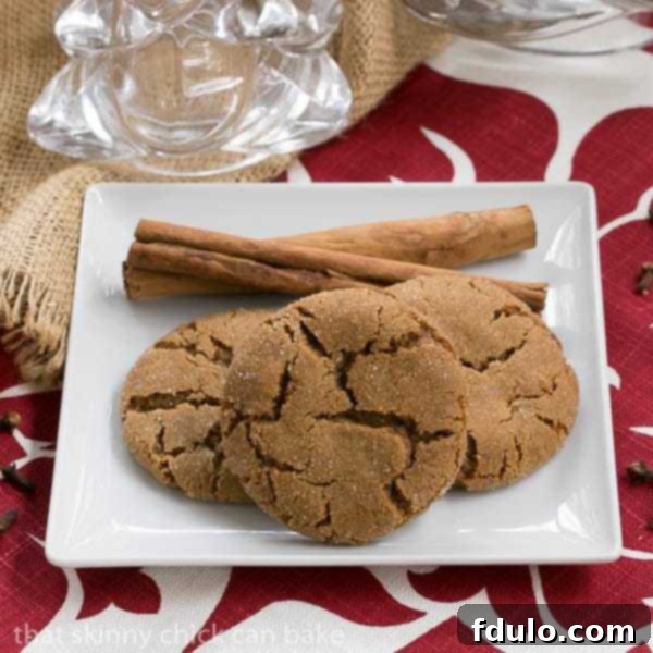 Delicious triple ginger snap cookies, with a crackled surface dusted with sugar.