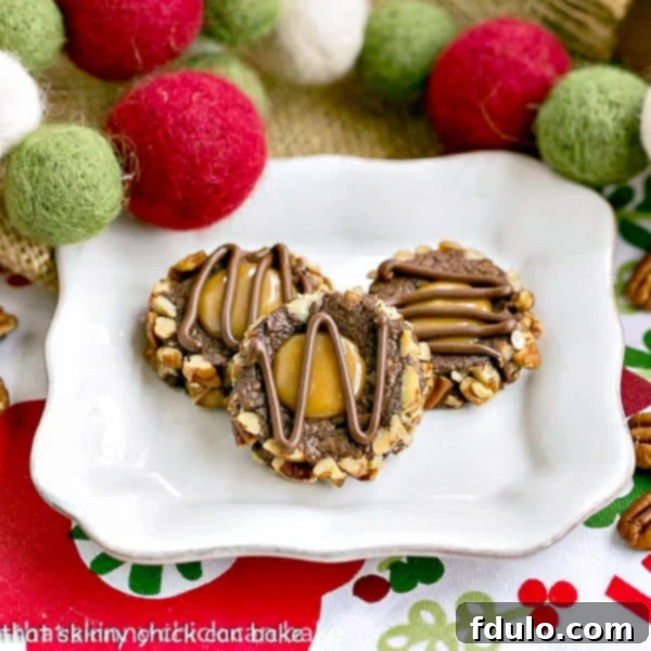Chocolate thumbprint cookies rolled in pecans and filled with caramel.