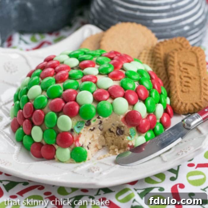 Cookie Dough Cheese Ball with a scoop removed to reveal the interior