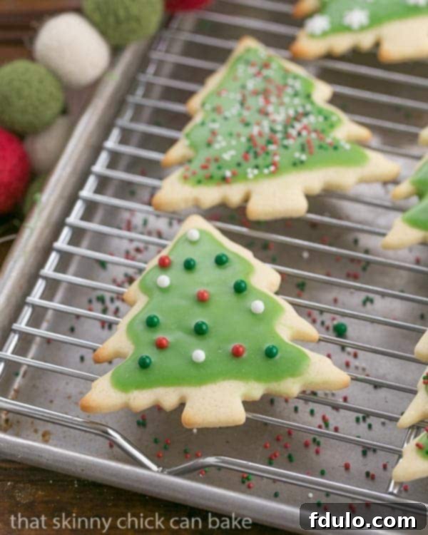 Homemade Sugar Cookies on a cooling rack, freshly baked.