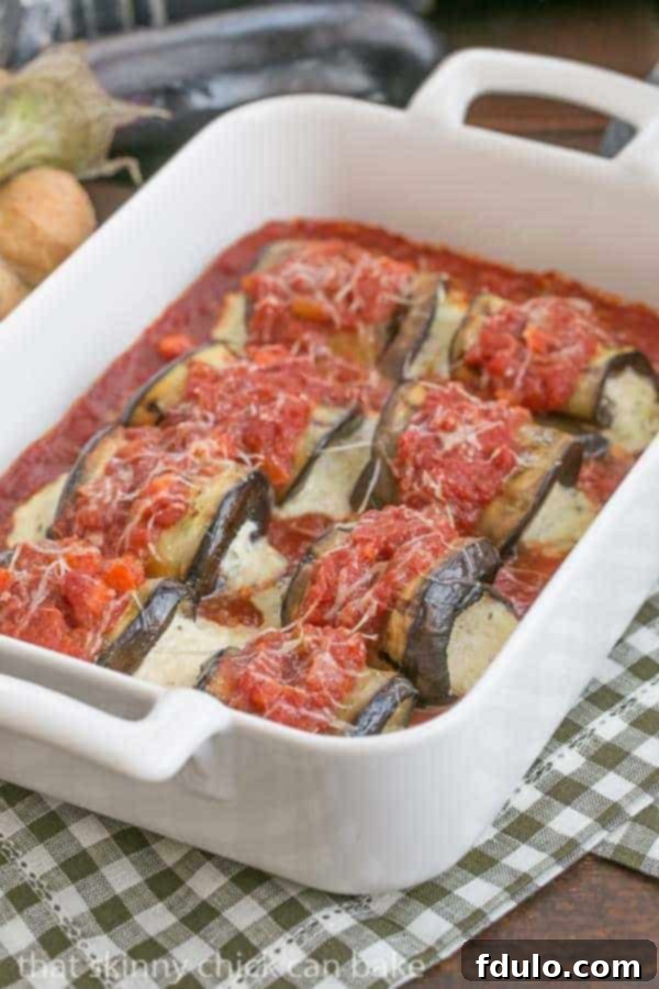 Creamy Ricotta Mozzarella Eggplant Rollatini 2 Eggplant Rollatini - A delightful vegetarian entree featuring grilled eggplant rolled around a ricotta mozzarella filling