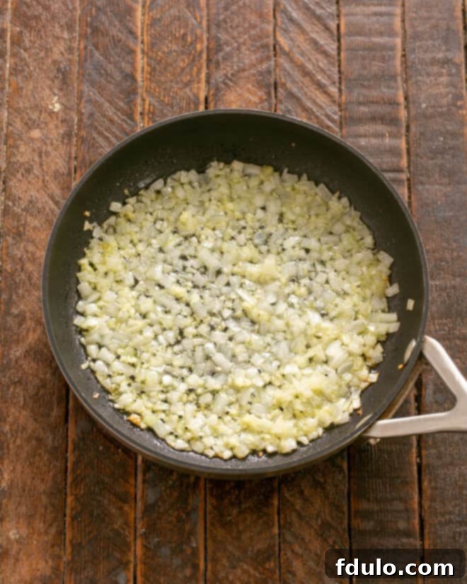 Sauteed onions and garlic in a saucepan