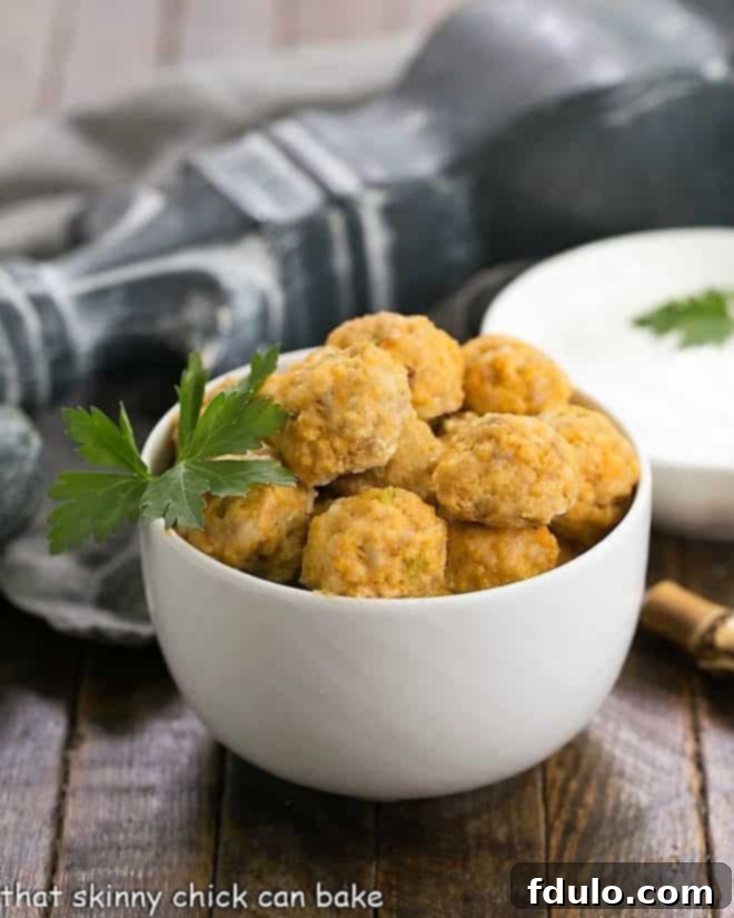 Buffalo Chicken Meatballs in a white serving bowl, ready to be enjoyed.