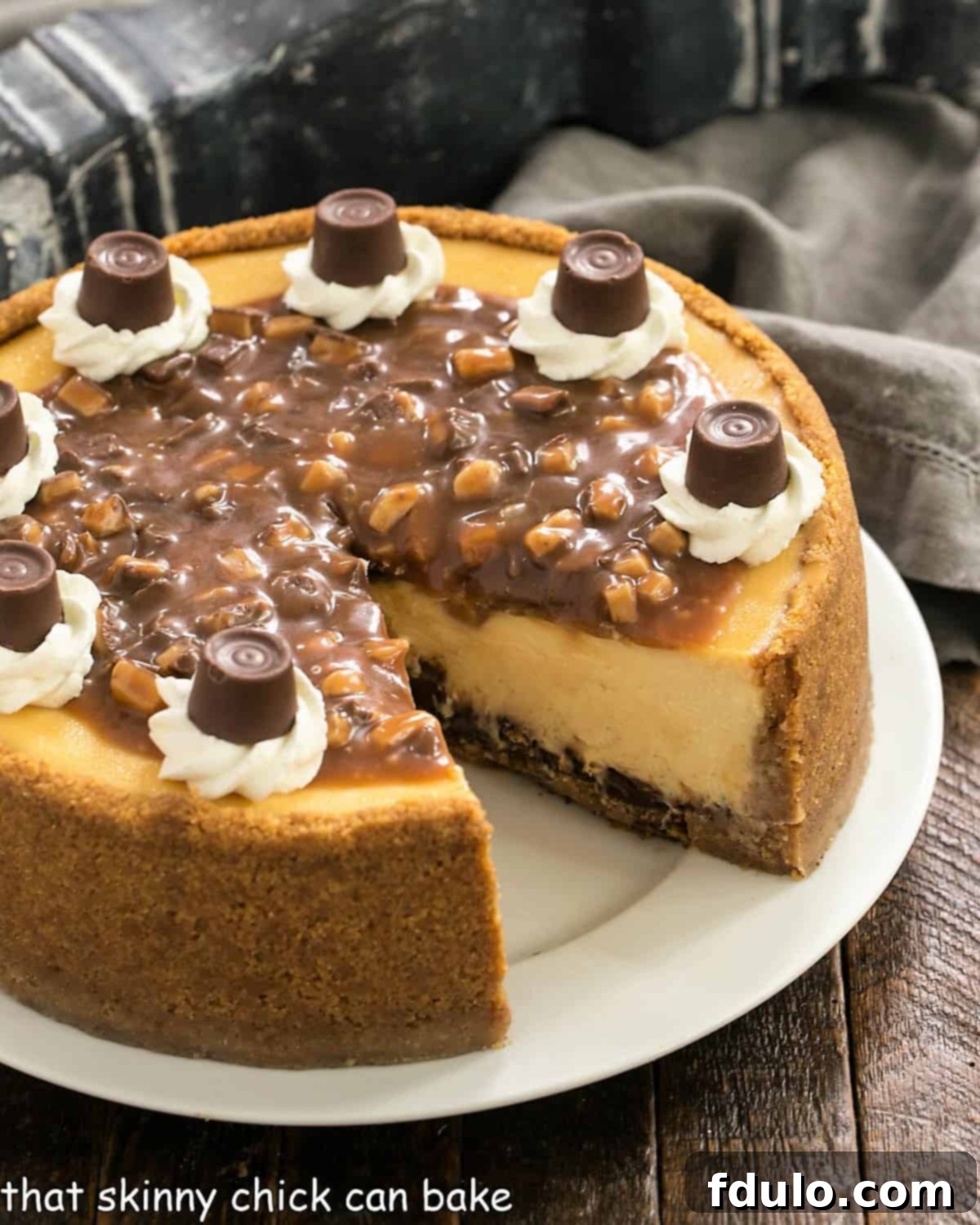 Caramel cheesecake on a white serving plate with a slice removed