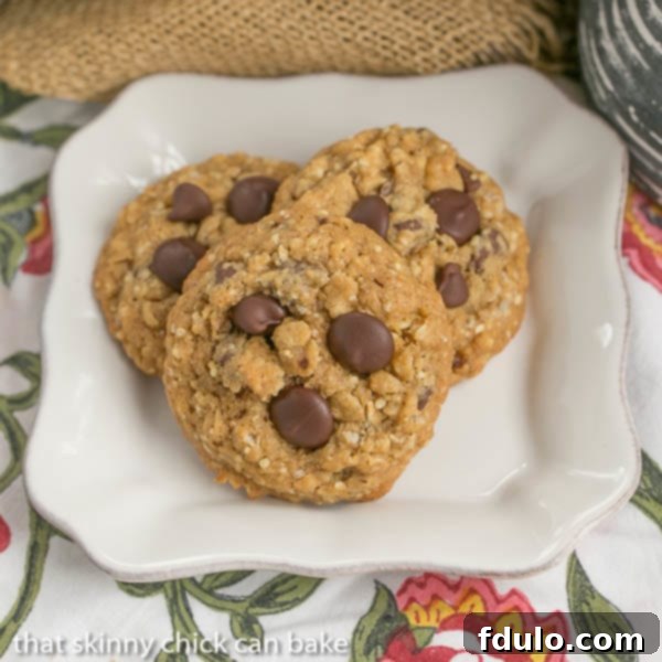 A beautiful platter overflowing with warm Oatmeal Chocolate Chip Cookies, ready to be enjoyed.