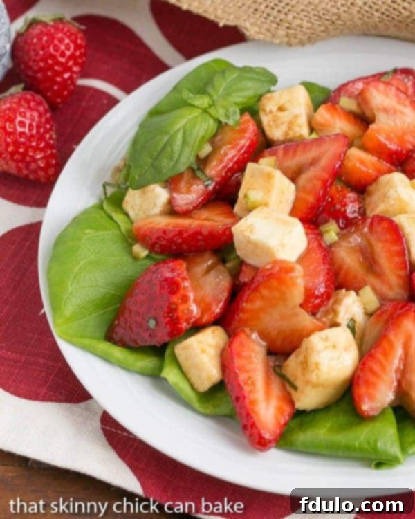 Brie Basil and Strawberry Salad | Ripe berries and creamy brie pair deliciously in this gorgeous salad