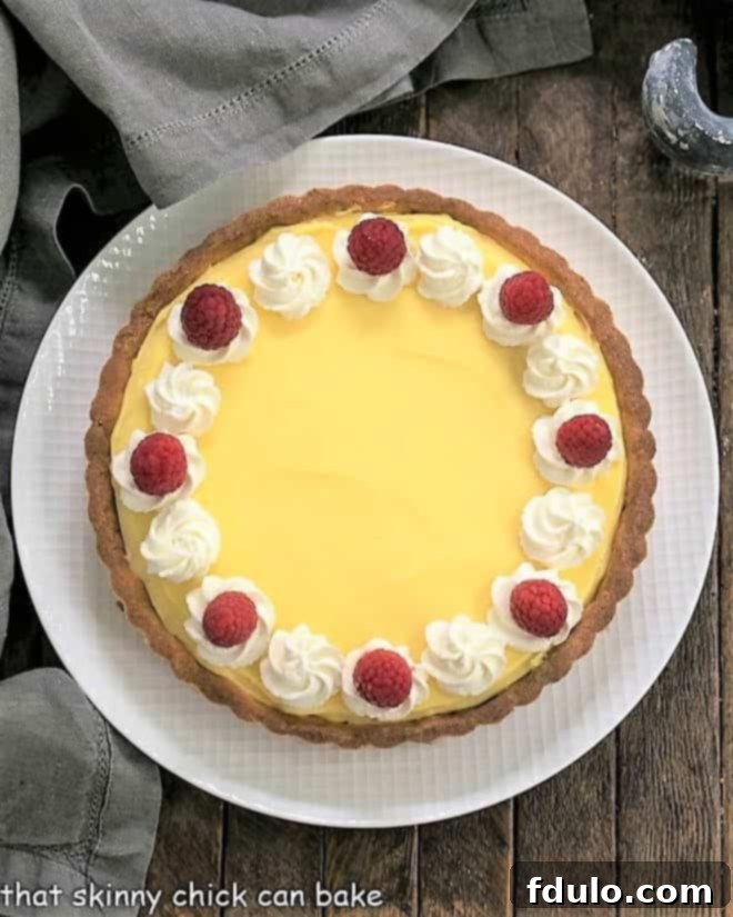 Step 10: Finish the lemon tart with garnish, ready to serve.