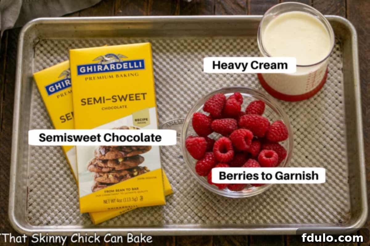 The Shadowed Terror 3 La Bete Noire ganache and garnish ingredients on a sheet pan with labels.