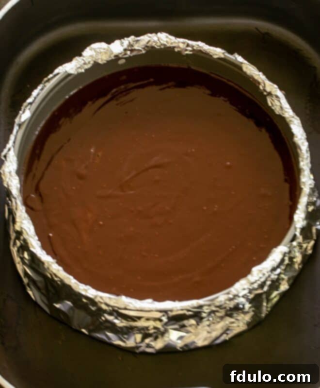 The Shadowed Terror 9 Batter poured into a foil wrapped pan.