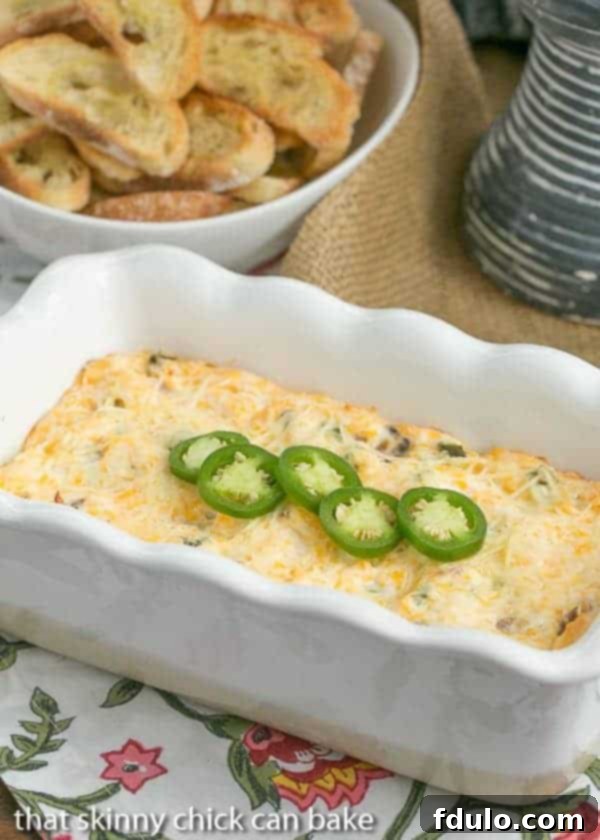 Delicious Jalapeno Popper Dip in a baking dish, ready to be served.