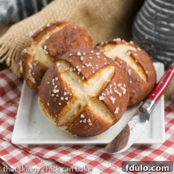 Pretzel Rolls | Chewy yeast rolls with all the fabulous flavor of a pretzel!