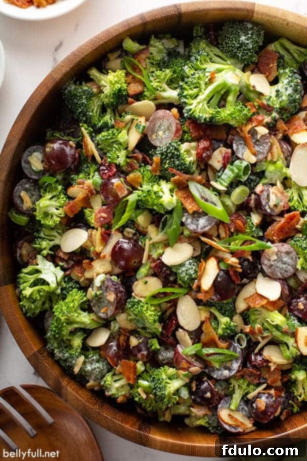 The Best Broccoli Salad Recipe with crisp broccoli florets, bacon, and a creamy dressing.