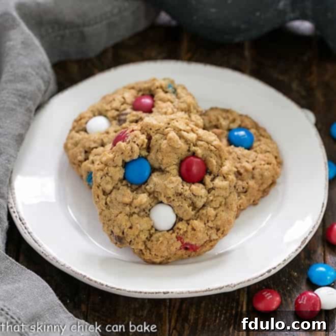 Patriotic Monster Cookies with red, white, and blue M&Ms, a fun and chewy dessert.