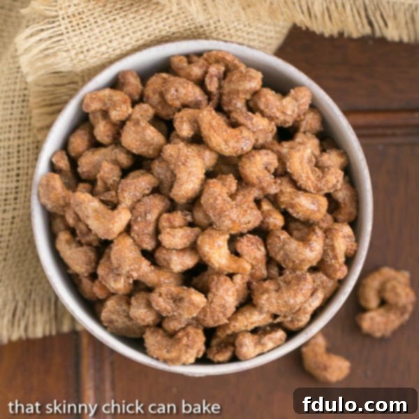 Candied Cashews - Sweet, crunchy nuts with a touch of heat! Top view of a bowl of Spicy Sugared Cashews.