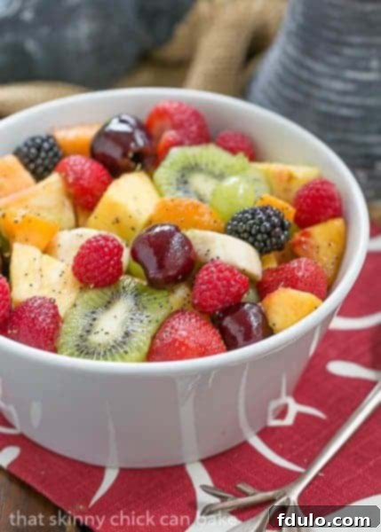 Honey Lime Fruit Salad | Scrumptious fresh fruit dressed with honey, lime juice, vanilla and poppy seeds for a Picnic Lunch