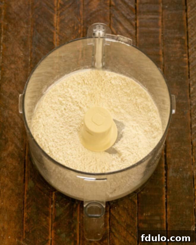 Step 1: Flour, sugar, and salt processed in a food processor.