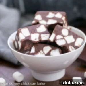 Dreamy Chocolate Marshmallow Fudge 3 Chocolate marshmallow fudge in a white bowl, ready to be served.