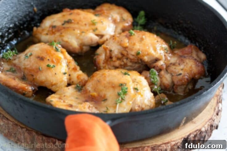 Beloved Chicken Dishes 14 Glossy Apricot-Ginger Glazed Chicken pieces in a pan, ready to serve.