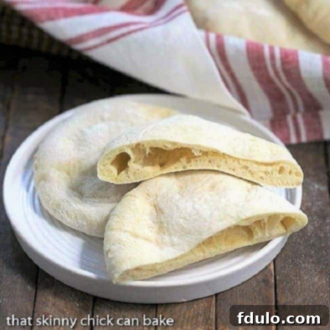 Homemade Pita Bread on a round white plate, ready to be served or stuffed.