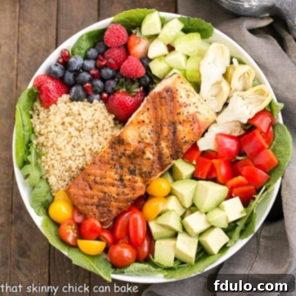 Superfoods salad is loaded with healthy, nutritious fruits and vegetables, protein-rich quinoa, and omega-3 packed salmon!