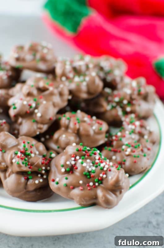 Crockpot Candy, an easy and delicious chocolate, peanut, and almond candy made in a slow cooker, perfect for holidays.
