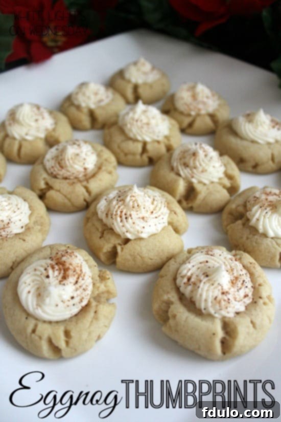 Eggnog Thumbprint Cookies, featuring a rich eggnog-flavored cookie with a festive filling.