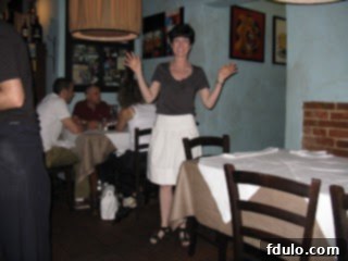 Liz enjoying a meal inside Trattoria dei Quattro Leoni, Florence, Italy, the very place she first discovered farro soup.