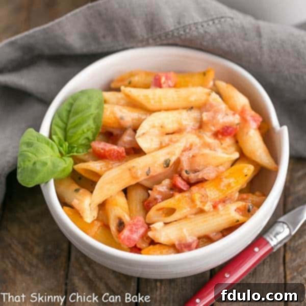 Cheesy Baked Pasta | Creamy pasta with 3 cheeses, basil and prosciutto