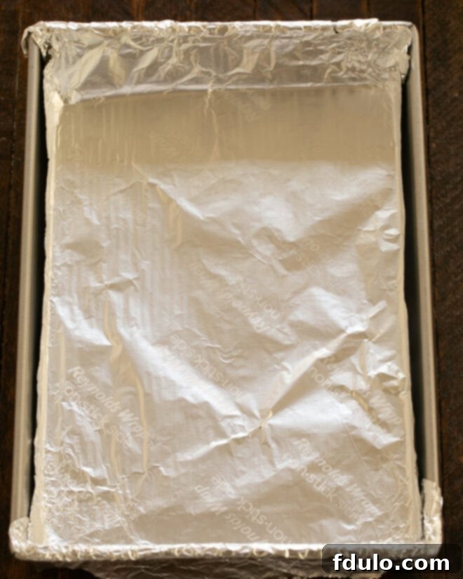 Baking pan lined with non-stick foil.