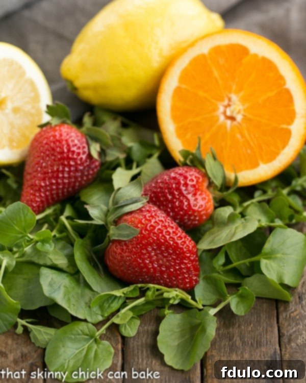 Fresh ingredients for a Salmon Watercress Salad on a wooden board
