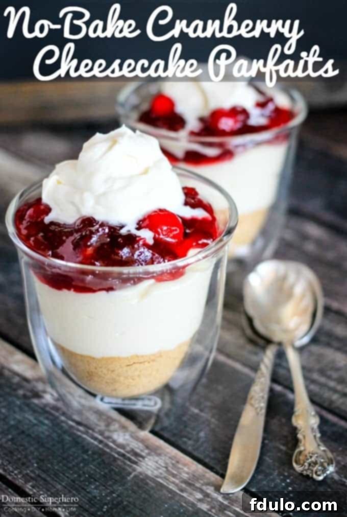 Festive No-Bake Cranberry Cheesecake Parfaits, ideal for Christmas.
