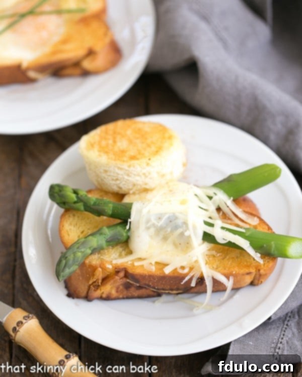 Asparagus topped eggs with hats on a white ceramic plate