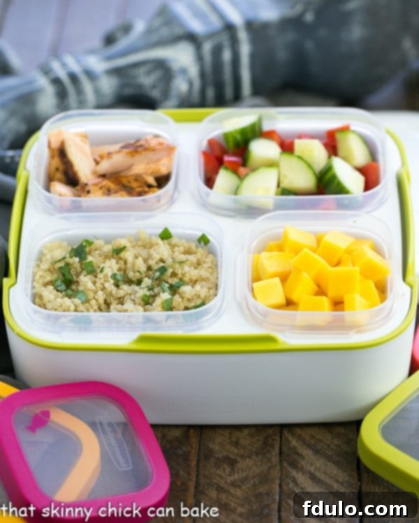 Healthy Caribbean Salmon Quinoa Salad perfectly portioned in a meal prep container Caribbean Salmon Quinoa Salad prepped in a Rubbermaid Balance Meal Kit container