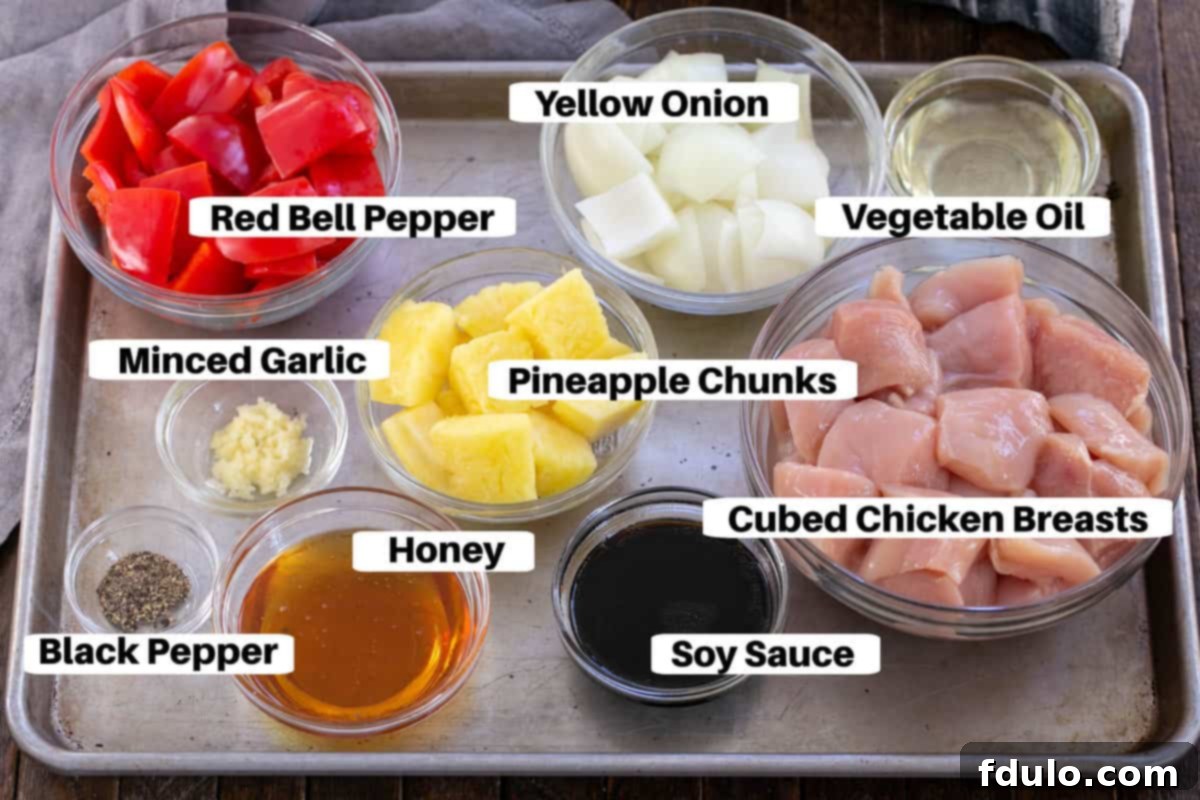 Sticky Honey-Glazed Chicken Skewers 2 Chicken Kabob Ingredients with labels laid out on a metal sheetpan, showcasing freshness.