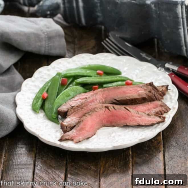 Korean Grilled Flank Steak slices garnished with sesame seeds