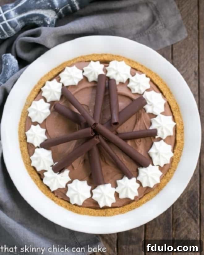 Chocolate Cream Pie presented from an overhead view, highlighting the smooth texture and decorative elements.