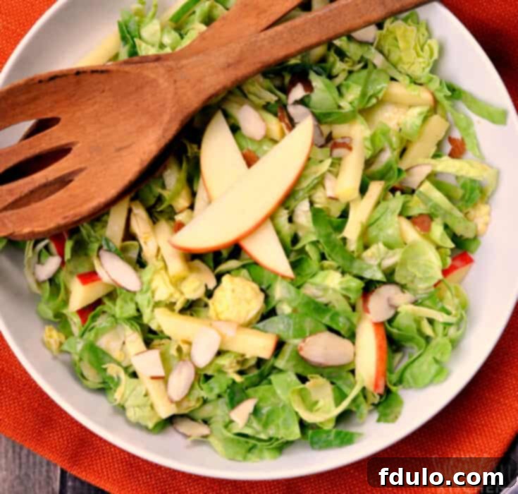 Shaved Brussels Sprouts Salad with apples and almonds, served with Cheddar Broccoli Soup.