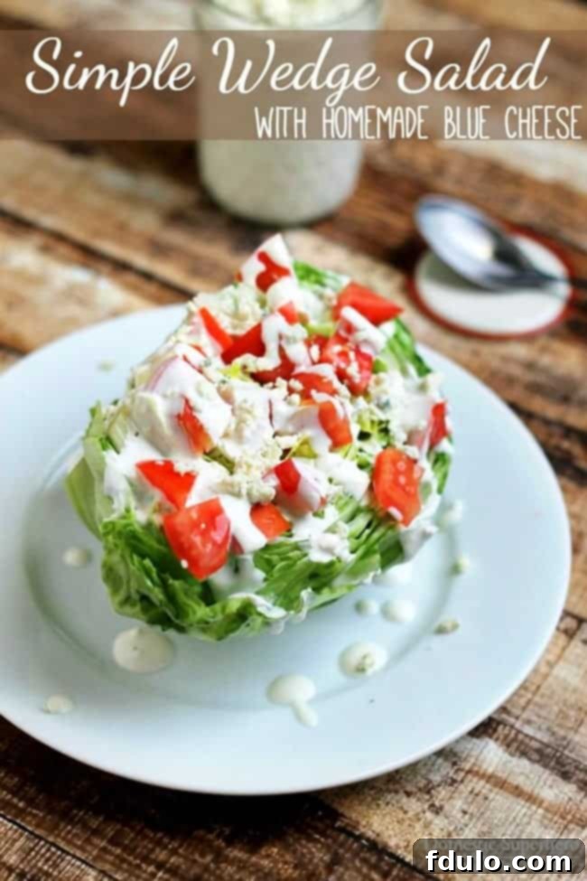 The BEST Simple Wedge Salad, a classic with crisp iceberg lettuce and homemade blue cheese dressing.