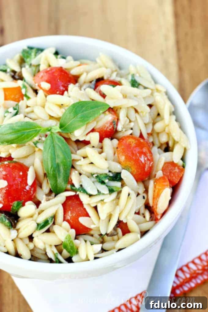 Mediterranean Orzo Salad, a healthy pasta salad filled with your favorite Mediterranean ingredients.