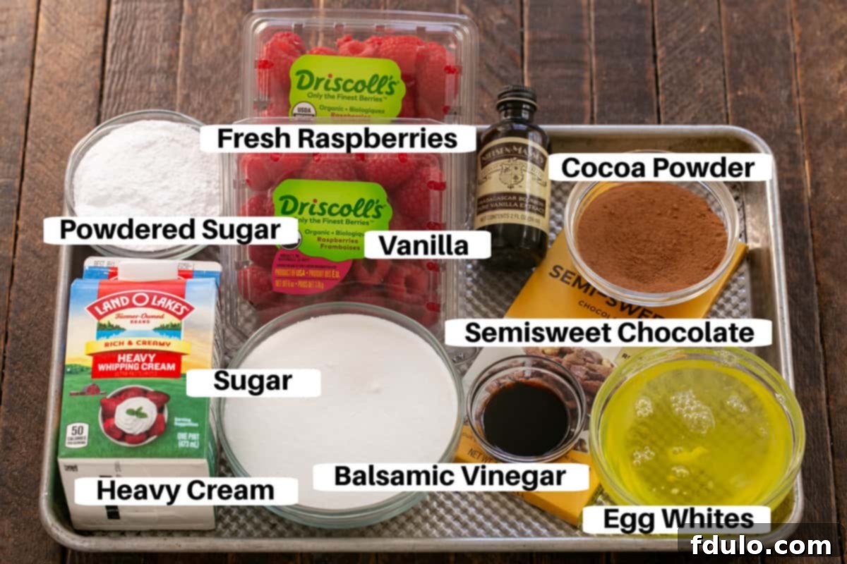 Ingredients for Chocolate Pavlova laid out on a metal sheet pan with labels.