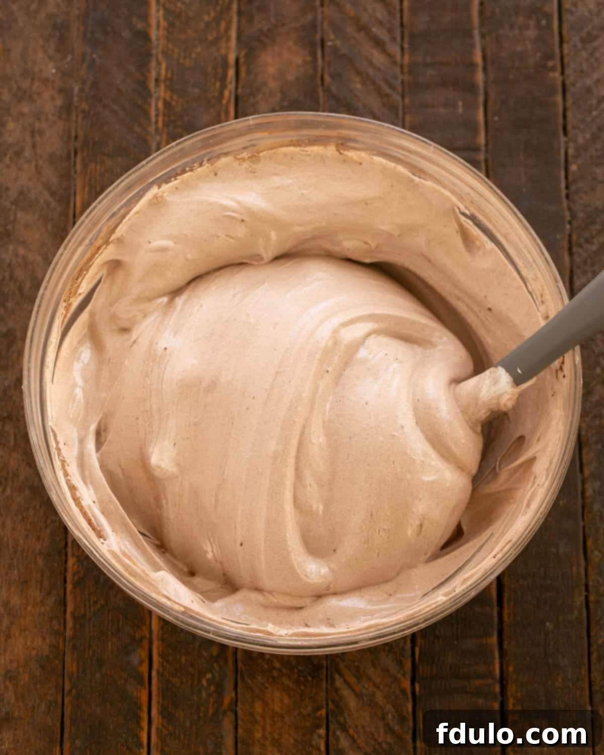 Egg whites combined with cocoa and chocolate, ready for shaping.