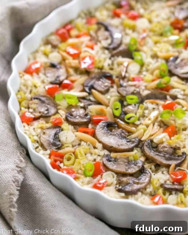 Italian Rice Pilaf with Toasted Almonds in a shallow casserole dish.