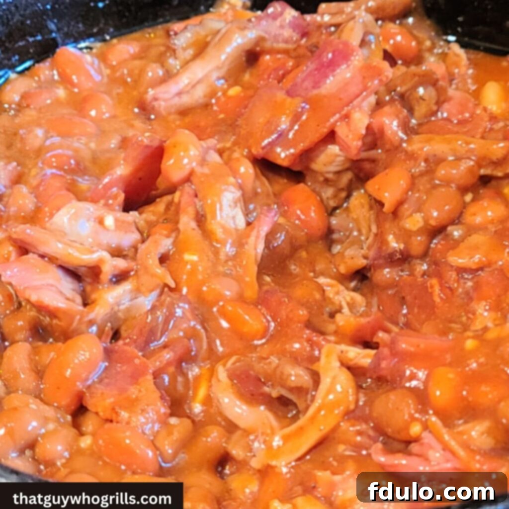 Next-Level Smoked Sides 6 Smoked Pulled Pork Baked Beans in dutch oven